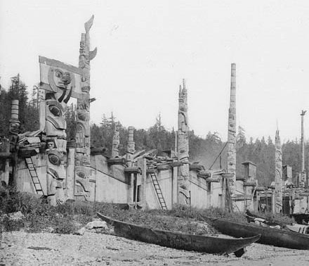 Haida houses and totem poles.